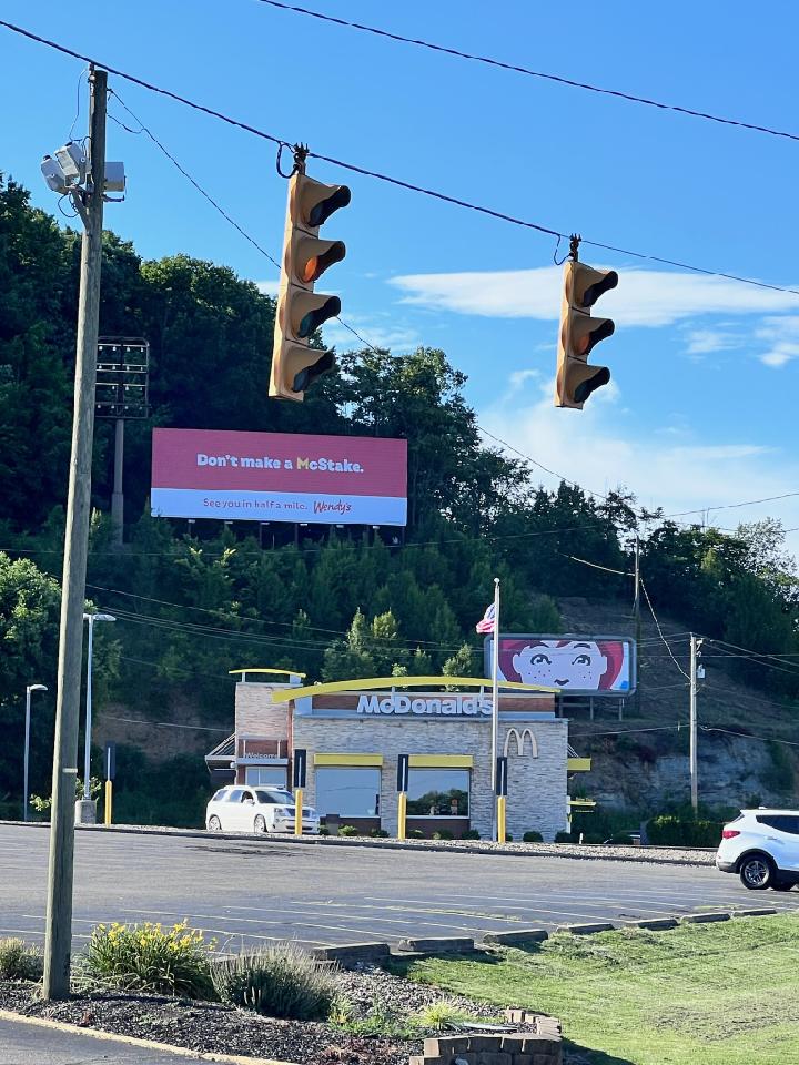 McDonald's restaurant with traffic lights.